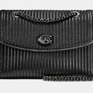 Coach Parker with quilting and rivets